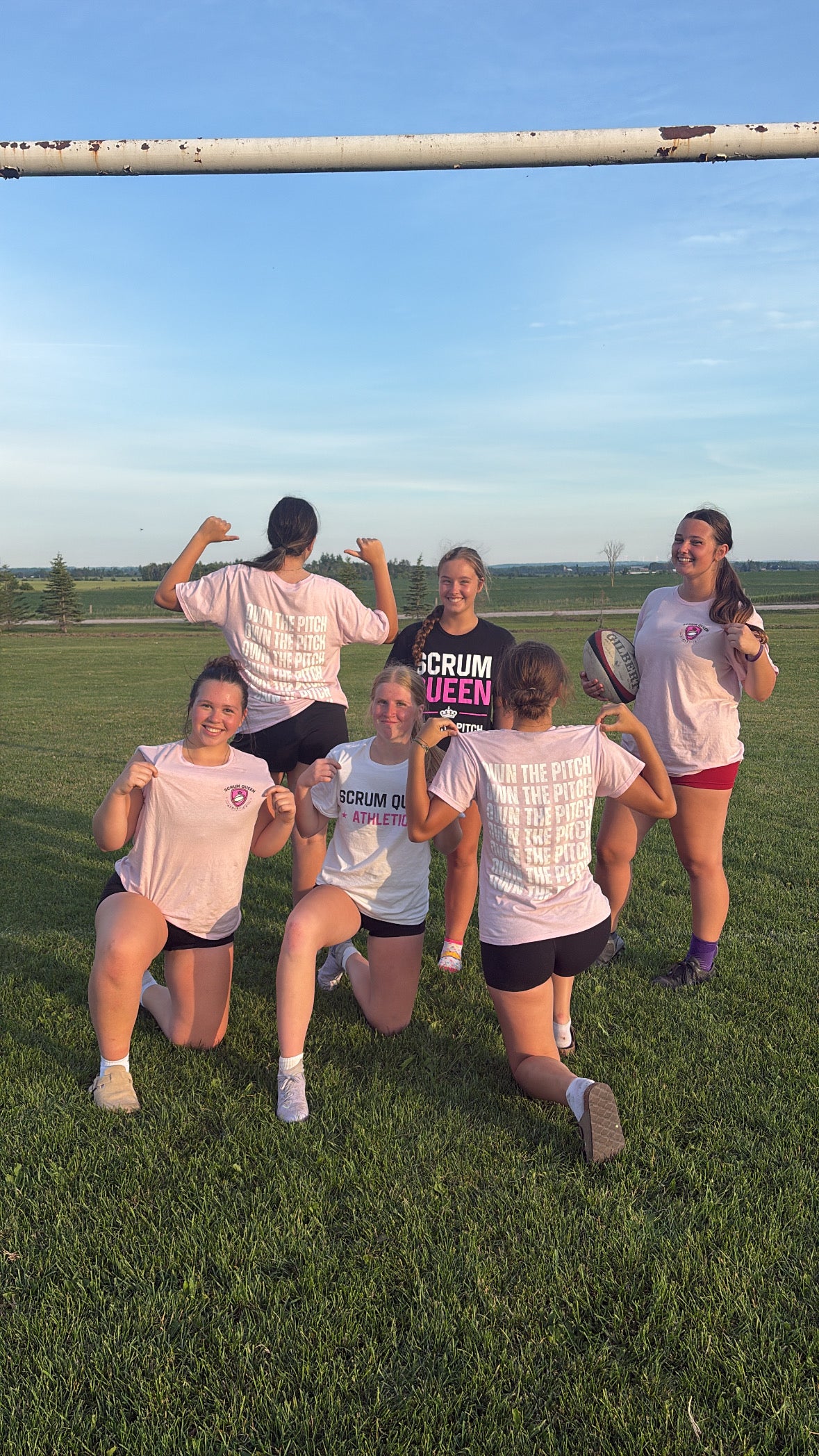 Scrum Queen Athletics players wearing the collection on a rugby field