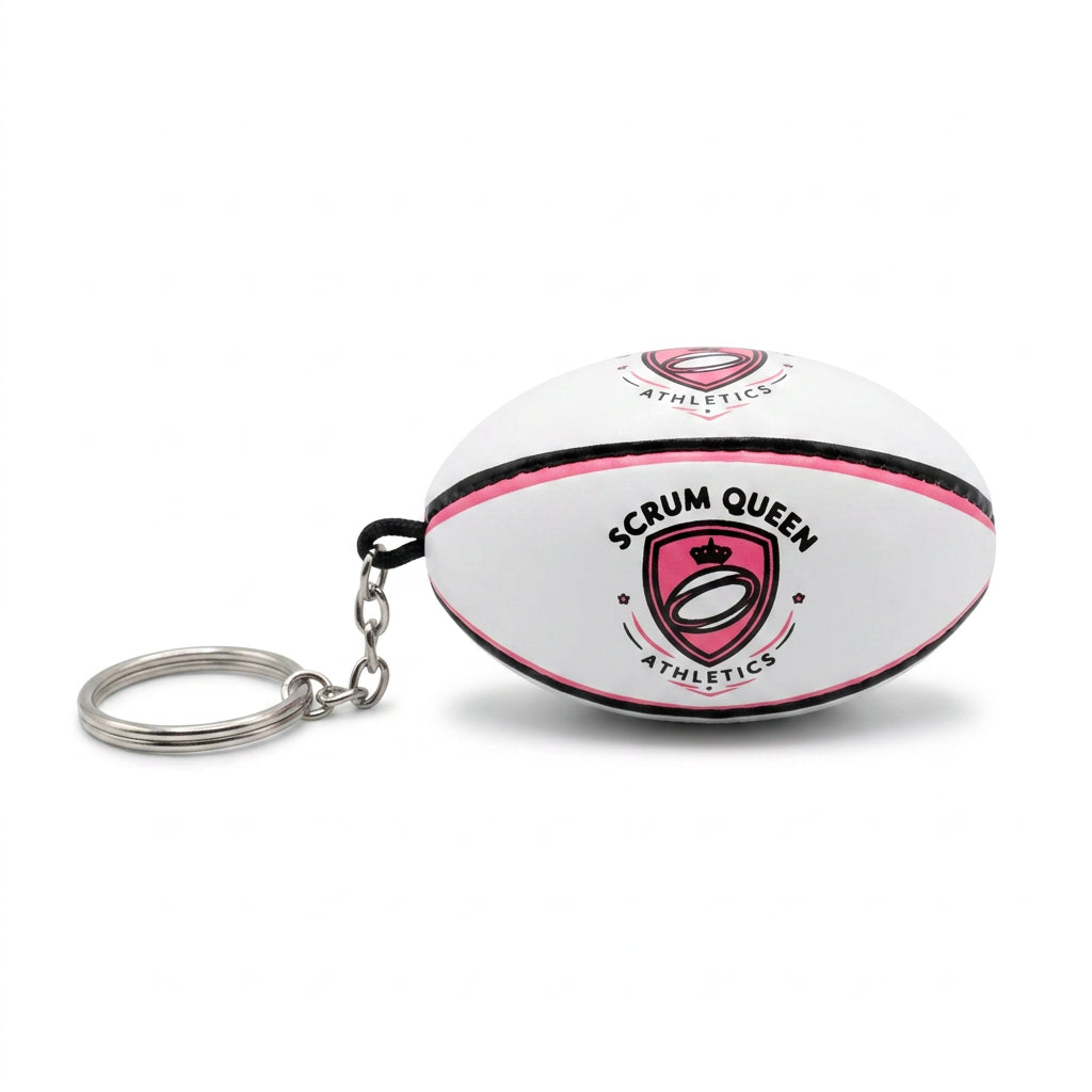 Mini rugby ball keychain on white background